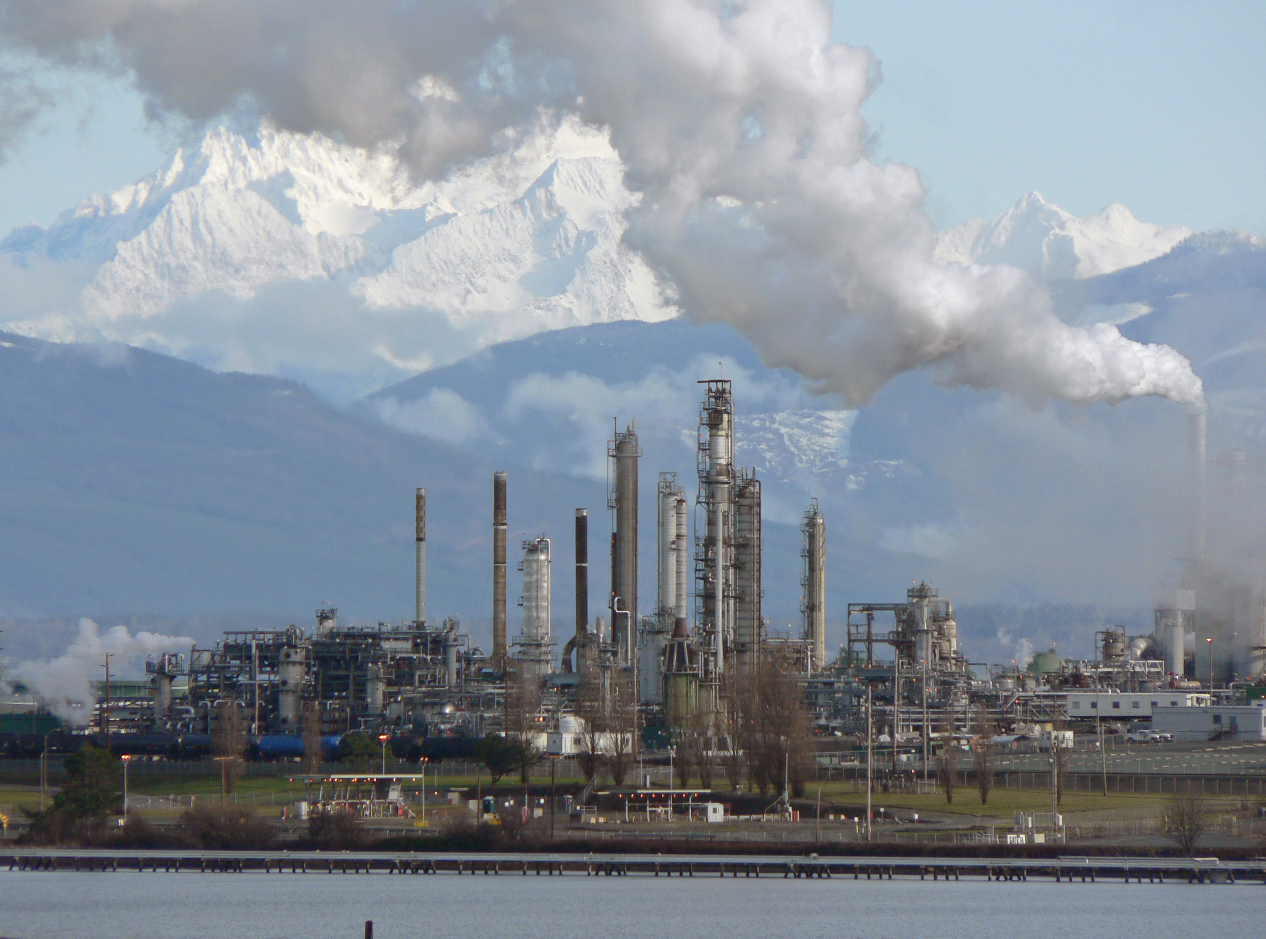 Process towers and pipework at an industrial refinery