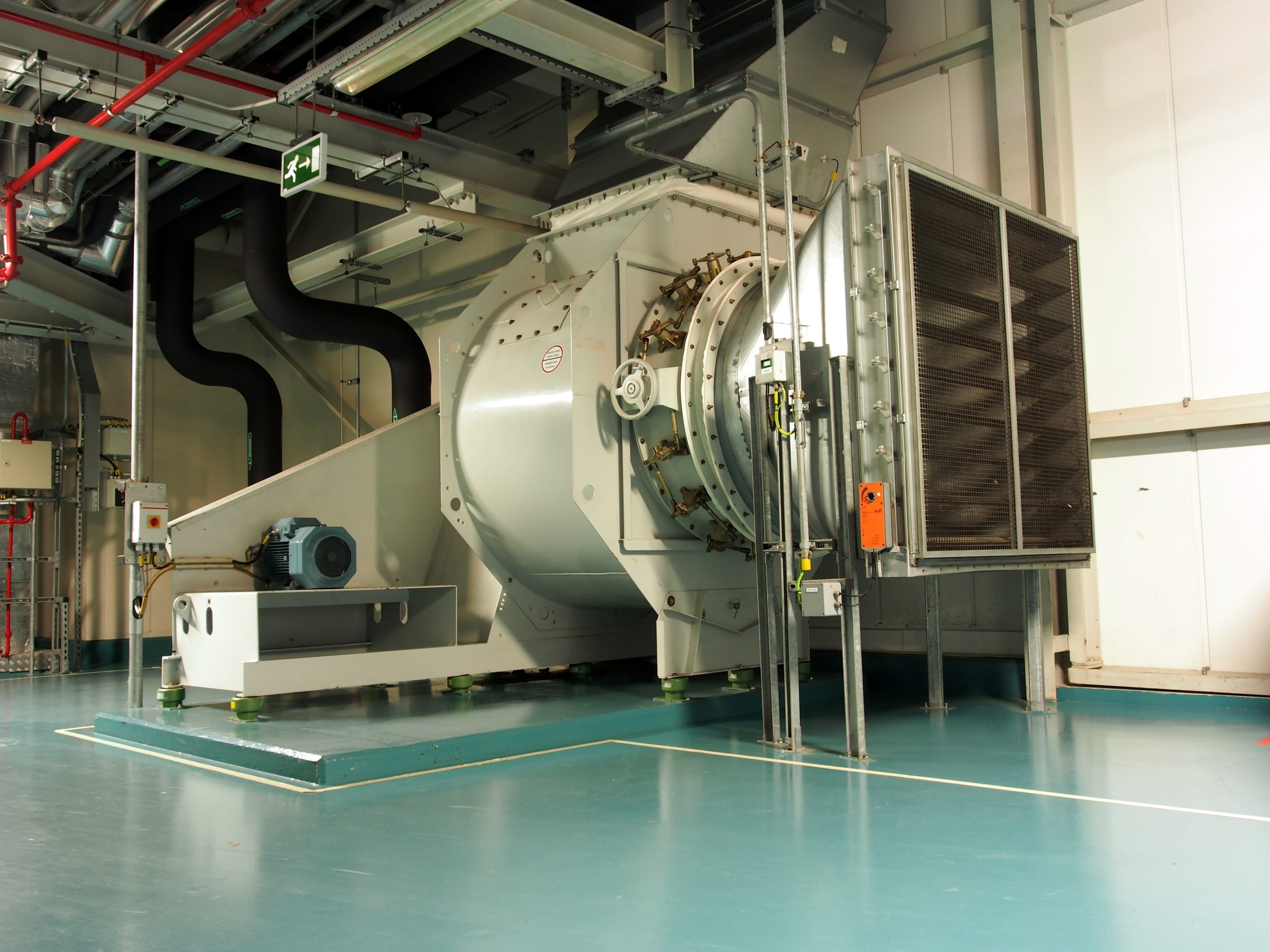 Industrial air-handling equipment with large supply fans in a clean mechanical room
