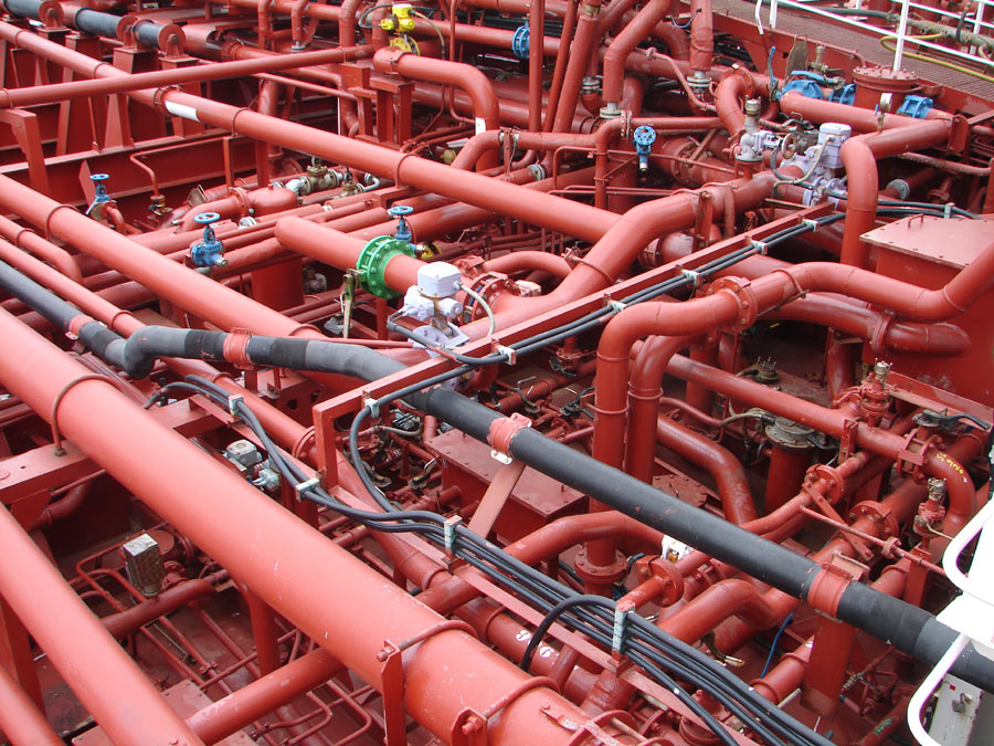 Process pipework, valves, and instrumentation on a chemical tanker